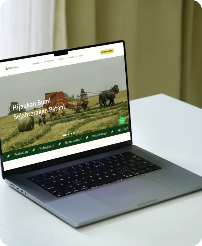 Global Village website on laptop